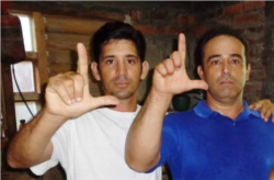 Yordan Mariño (izq.) y Eduardo Cardet del Movimiento Cristiano Liberación.