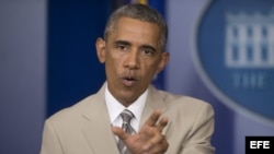 El presidente de EE.UU., Barack Obama, ofrece una declaración en la sala de prensa de la Casa Blanca, hoy jueves 28 de agosto de 2014, en Washington DC.