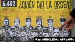 Miles de ejecuciones extrajudiciales conocidas como "falsos positivos" se llevaron a cabo en el mayor escándalo de las fuerzas militares colombianas en su lucha de más de medio siglo contra los grupos rebeldes. Bogotá, el 16 de marzo de 2021. Foto: Raúl ARBOLEDA / AFP.