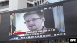 Archivo - Noticiero de Honk Kong dando información sobre Edward Snowden. 