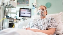 Paciente con mascarilla de respirador Mercedes - UCL