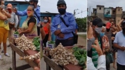 Vecinos del reparto Luz, en Holguín, impiden que las autoridades multen y decomisen la mercancía a un vendedor de alimentos. (Captura de video/Facebook)