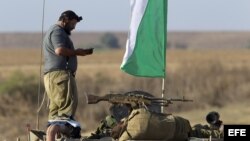 SOLDADOS ISRAELÍES DESCANSAN EN LA FRONTERA SUR CON FRANJA DE GAZA