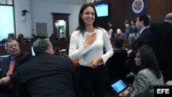 La diputada opositora venezolana Maria Corina Machado asiste hoy, viernes 21 de marzo de 2014, a la sesión ordinaria del Consejo Permanente de la Organización de Estados Americanos (OEA) en Washington, DC.