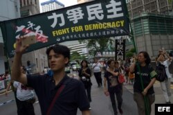 Pro-democracy activists march for the vindication of the June 4 massacre in Hong Kong