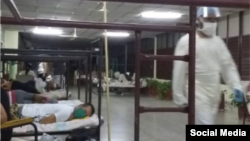 Centro aislamiento en la Facultad de Ciencias Médicas en Villa Clara. Los pacientes duermen en los pasillos. Publicado por @Hitman47984684