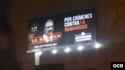 Valla publicitaria que condena a los dictadores de Cuba y Venezuela Raúl Castro y Nicolás Maduro.