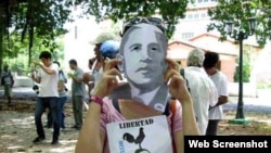 Damas de Blanco protestan con máscaras del presidente Barack Obama
