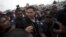 El expresidente de Guatemala Alfonso Portillo (c) es escoltado por autoridades guatemaltecas, durante el proceso de su extradición a Estados Unidos.