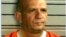 Mugshot: El general chavista Hugo Carvajal posa para la policía de Aruba