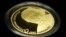 Detalle de una moneda en oro dedicada al fallecido escritor portugués José Saramago hoy, miércoles 22 de mayo de 2013.