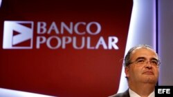 El presidente del Banco Popular, Ángel Carlos Ron, en una junta de accionistas de 2014.