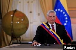 Miguel Díaz-Canel en una reunión con Nicolás Maduro, en el Palacio de Miraflores en Caracas, Venezuela, el 30 de mayo de 2018. REUTERS/Marco Bello
