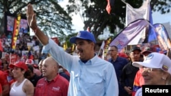 Venezuelan President Nicolas Maduro participates in a march in support of his victory in the July 28 elections, in Caracas