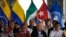 De izq, a der. Aureliano Carbonell, Pablo Beltrán, del ELN y Otty Patiño e Iván Danilo Rueda, representantes de Colombia, en una reunión en Caracas, el 21 de enero de 2023. AP Photo/Ariana Cubillos