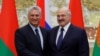 Alexander Lukashenko y Miguel Díaz-Canel en Minsk en octubre de 2019. Sergei Grits/Pool via REUTERS