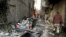 El escenario de un ataque con coche bomba en Yarmana, de mayoría drusa, en Damasco, Siria. 