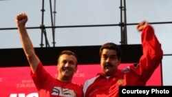 Tareck El Aissami junto a Maduro