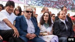 Los mandatarios Evo Morales (Bolivia), José Mujica (Uruguay) y Daniel Ortega (Nicaragua) en un acto en Caracas de apoyo al chavismo.