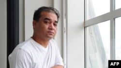 El profesor universitario Ilham Tohti, fotografiado en Beijing en 2010.