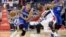 Foto de archivo de Michael Carter-Williams (i).