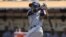 Yunel Escobar, de los Rays, bateó un sencillo al lanzador Sonny Gray de los Atléticos, el miércoles 6 de agosto de 2014.