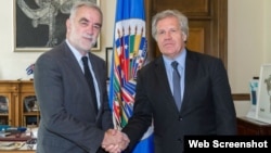 Luis Moreno Ocampo y Luis Almagro.