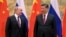 El presidente chino Xi Jinping (d) y el presidente ruso Vladimir Putin en Beijing, el 4 de febrero del 2022. (Alexei Druzhinin, Sputnik, Kremlin Pool Photo via AP, File)