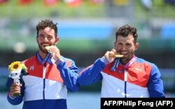 Cubanos ganadores de medalla de oro, Serguey Torres Madrigal y Fernando Dayán Jorge