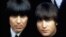 John Lennon y George Harrison.    