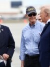 El presidente de Estados Unidos, Donald Trump, junto al senador Rick Scott en el Daytona International Speedway, el 16 de febrero de 2025 en Daytona Beach, Florida. Chris Graythen/Pool vía REUTERS