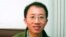 Archivo - Fotografía de archivo tomada el 9 de diciembre de 2005 que muestra al activista disidente Hu Jia, en su casa en Pekín (China). 