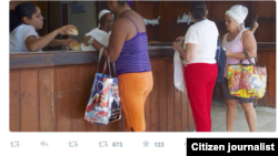 Reporta Cuba. Banderas y foto de Obama. Foto: Yusnaby.