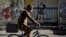 Escena captada el lunes en una calle de La Habana (Yamil Lage/AFP).