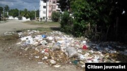 La calle Santa Rita entre 17 y 18 Norte en el Reparto Caribe en Guantánamo, es un área donde proliferan los vectores y la contaminación.