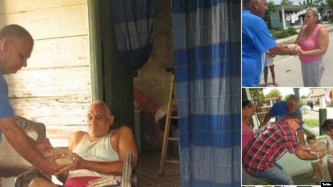 Activistas del proyecto humanitario Capitán Tonsique entregan almuerzos a desamparados y personas de bajos recursos en la localidad de Colón, en Matanzas. 