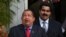 El presidente de Venezuela, Hugo Chávez (i), y su ministro de Exteriores, Nicolás Maduro (d), 2011 en el palacio de Miraflores en Caracas (Venezuela).
