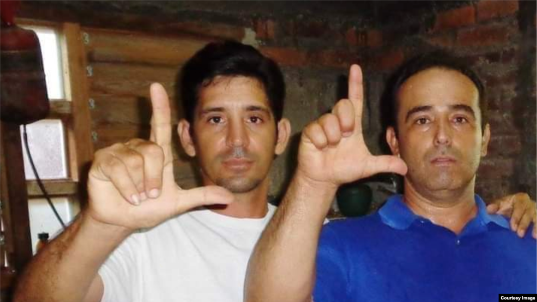 Yordan Mariño (izq.) y Eduardo Cardet del Movimiento Cristiano Liberación.