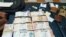El dinero y la documentación encontrada en poder de los cubanos detenidos en El Alto. 