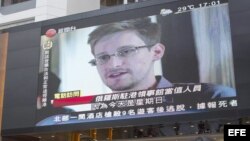 Archivo - Noticiero de Honk Kong dando información sobre Edward Snowden. 