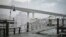 Un paseo marítimo en el puerto deportivo de Clearwater Harbor, Florida, queda inundado por la marea creciente, el 30 de agosto de 2023, después de que el huracán Idalia tocara tierra.