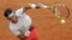Rafael Nadal en acción frente a David Ferrer.
