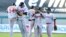 Los jugadores de República Dominicana celebran la victoria ante Puerto Rico por 6-2, en el estadio Sonora de la ciudad de Hermosillo (México).