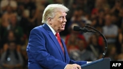 El presidente de Estados Unidos, Donald Trump, habla en la escuela secundaria Wheeler, en Marietta, Georgia, el 22 de julio de 2026. 