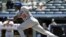 El jardinero Yasiel Puig dijo a ESPN que su centro de interés es la pelota, bien si juega para Cuba o para los Dodgers.