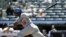 El jugador de los Dodgers Yasiel Puig en acción ante los Yanquis hoy, miércoles 19 de junio de 2013.