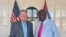 Mike Hammer junto al embajador de las Bahamas en Cuba, Dr. Elliston Rahming.