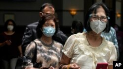 Residentes de Hong Kong en medio de la pandemia.