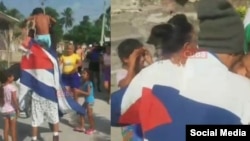 La familia de Bárzaga Mompié lo esperó con una bandera cubana.