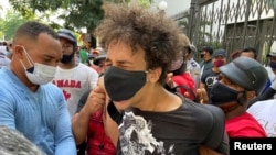 Un cubano detenido en una manifestación pacífica en el Capitolio. REUTERS/Stringer